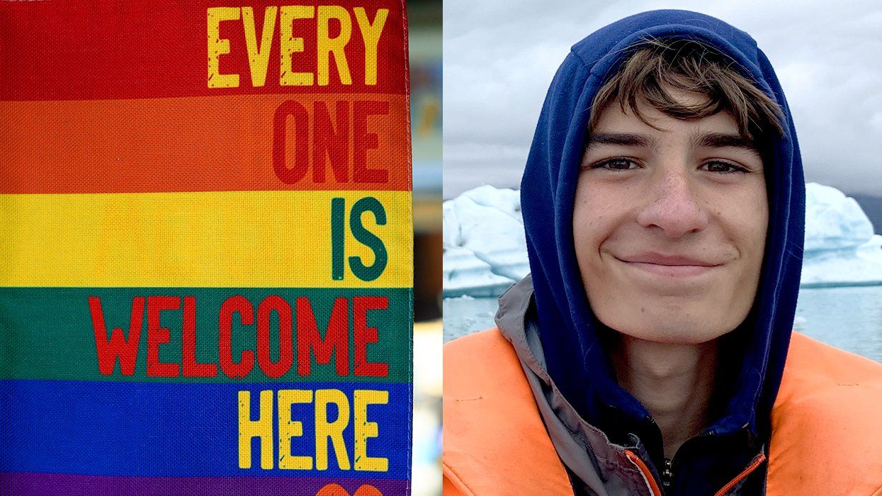 rainbow flag says everyone is welcome here alongside writer Jack Normandin