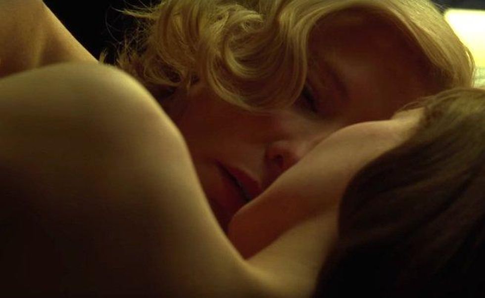 Rooney Mara and Cate Blanchett kiss in Carol