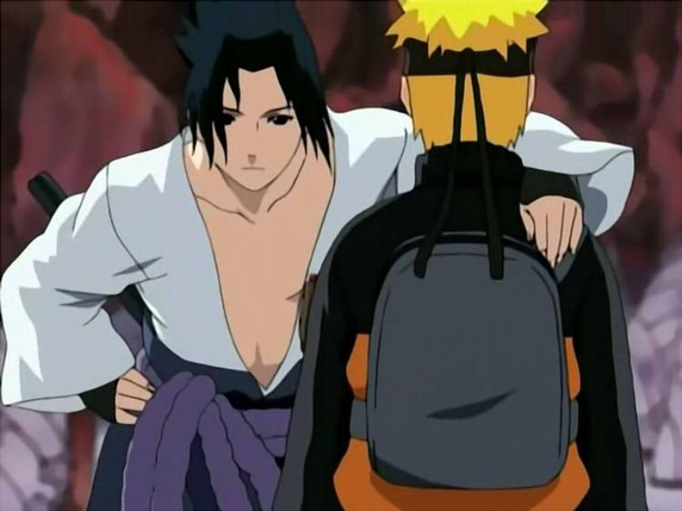Sasuke grabbing Naruto
