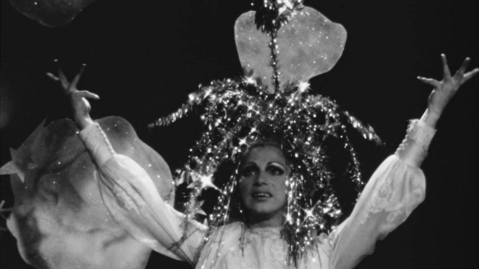 Scarecrow in a Garden of Cucumbers