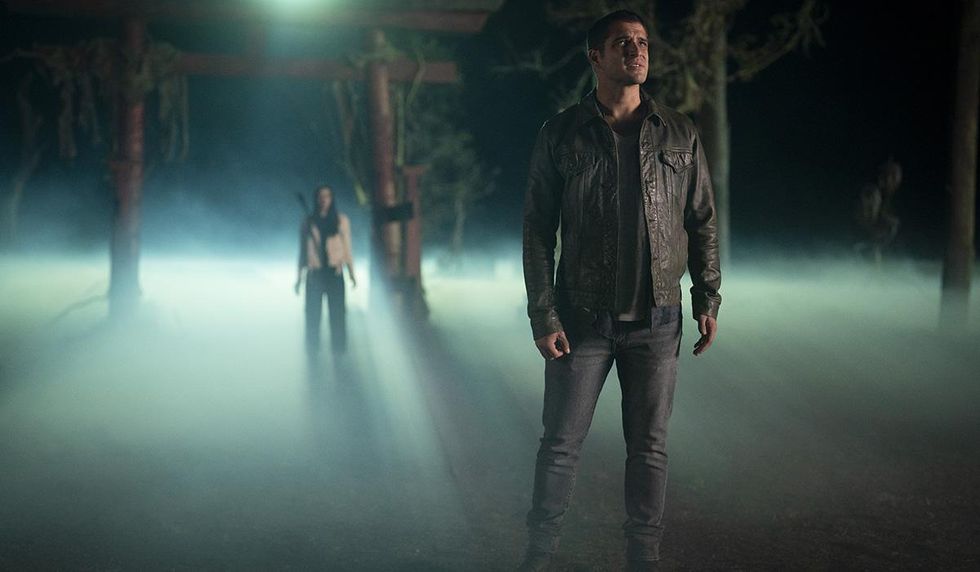 Scott and Alison stand in the mist in Teen Wolf: The Movie