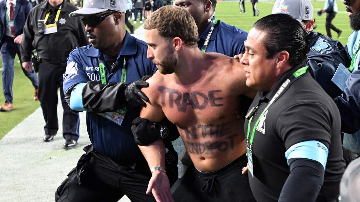 Streaker Alex Gonzalez being arrested at the Super Bowl