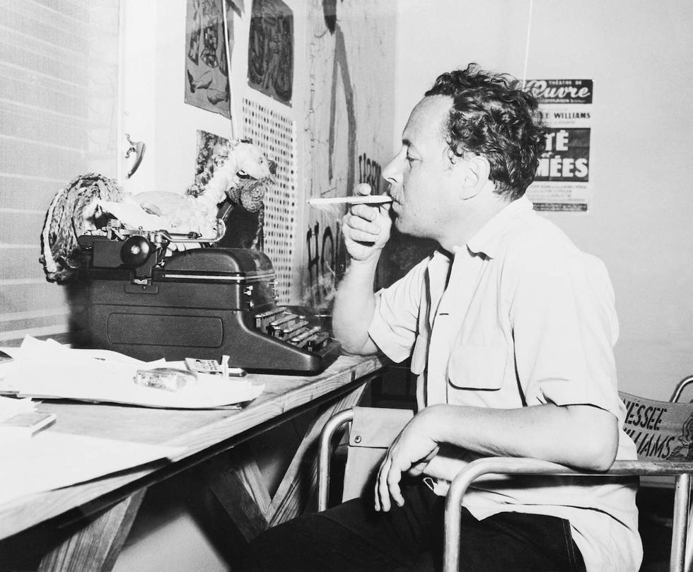 Tennessee Williams at his typewriter in his Key West home, 1957