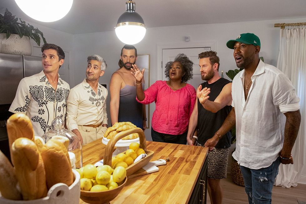 the fab 5 in a kitchen with hero