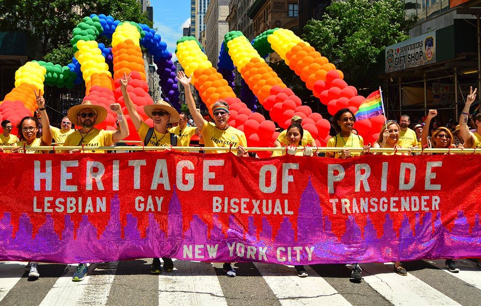 The Heritage of Pride banner kicks off the Gay Pride Parade with a banner and balloons in New York City and celebrates the LBGT community
