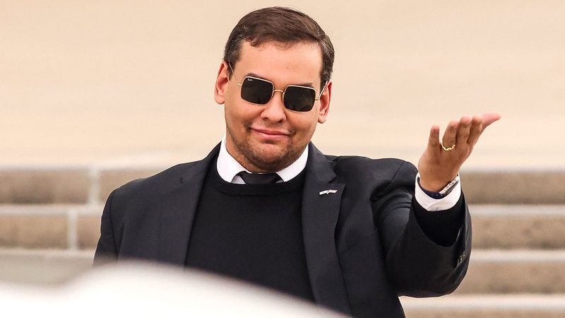 Then Congressman George Santos leaves court on Long Island