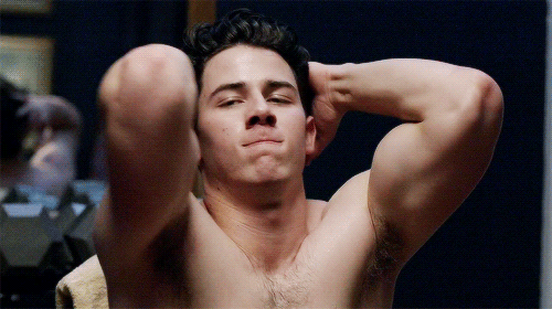 This is a GIF of Nick Jonas from 'Scream Queens.'