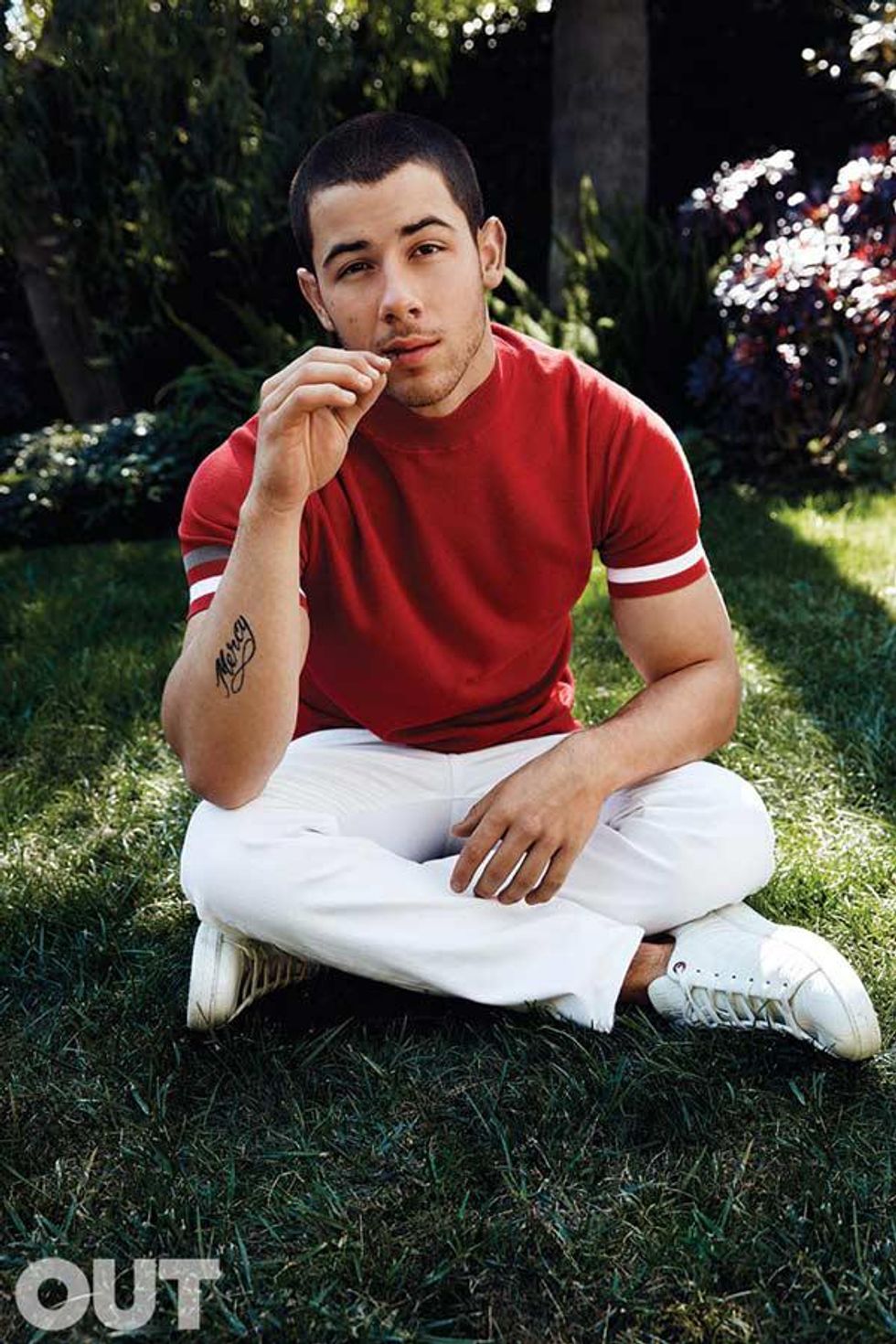 This is a photo of Nick Jonas for OUT magazine. 