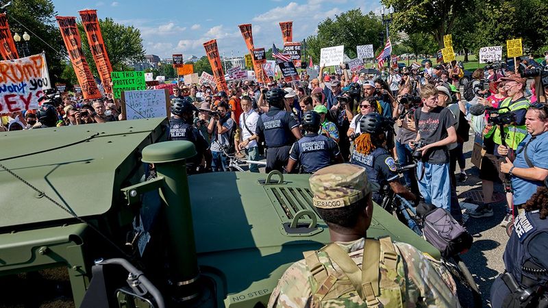 thousands marching through Washington DC in protest of Donald Trump