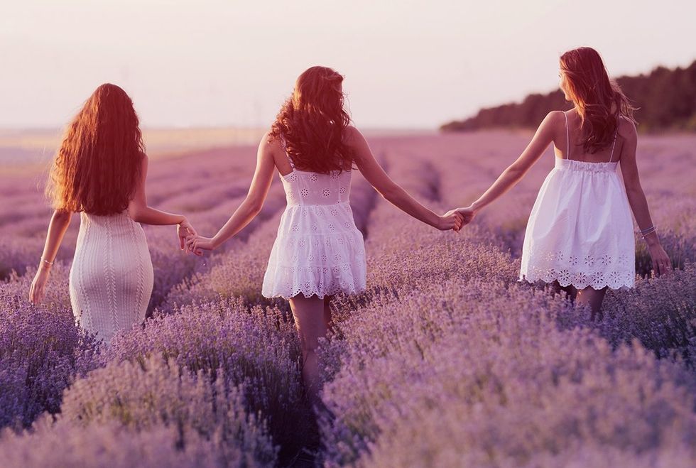 three women in white dresses walking in lavender fields holding hands at sunset photo gallery listicle Lesbians reveal the spiciest things on their sexual bucket list