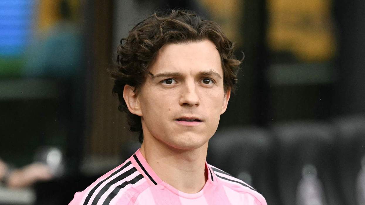 Tom Holland wears a Miami jersey.