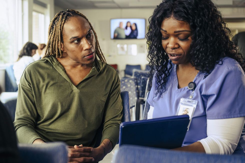 Transgender woman talking to a doctor