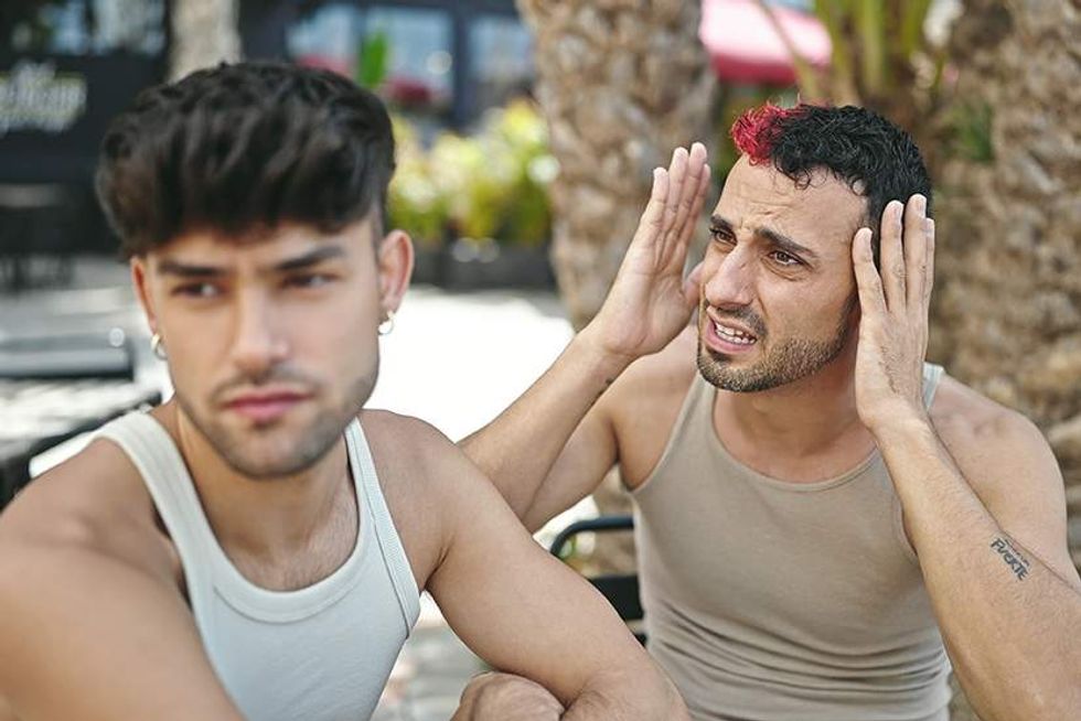 two gay men fighting