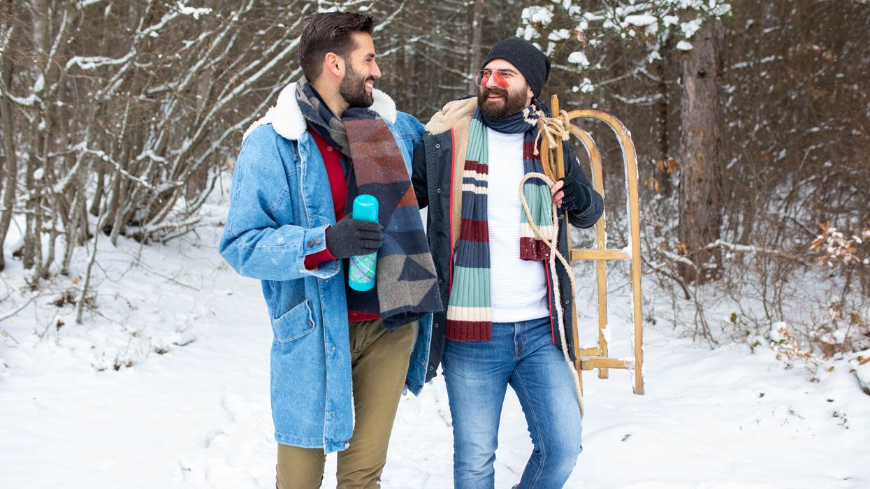 Two gay men going sledding