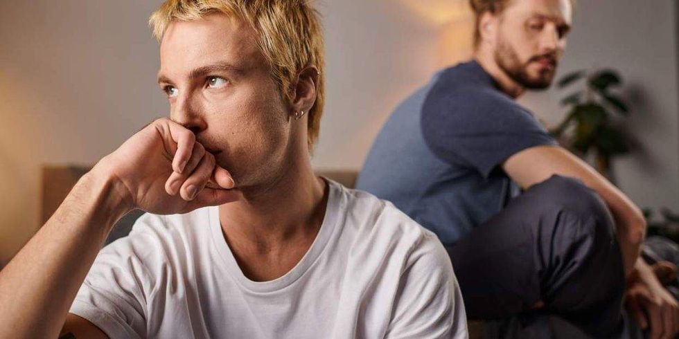 two gay men in a argument turned away from each other