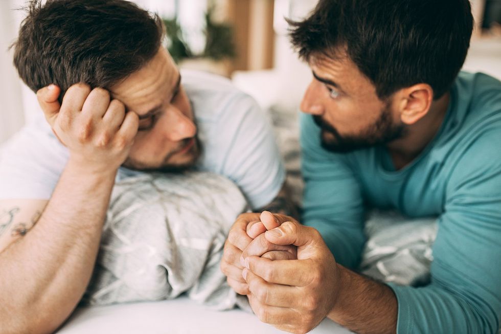 two men looking at each other