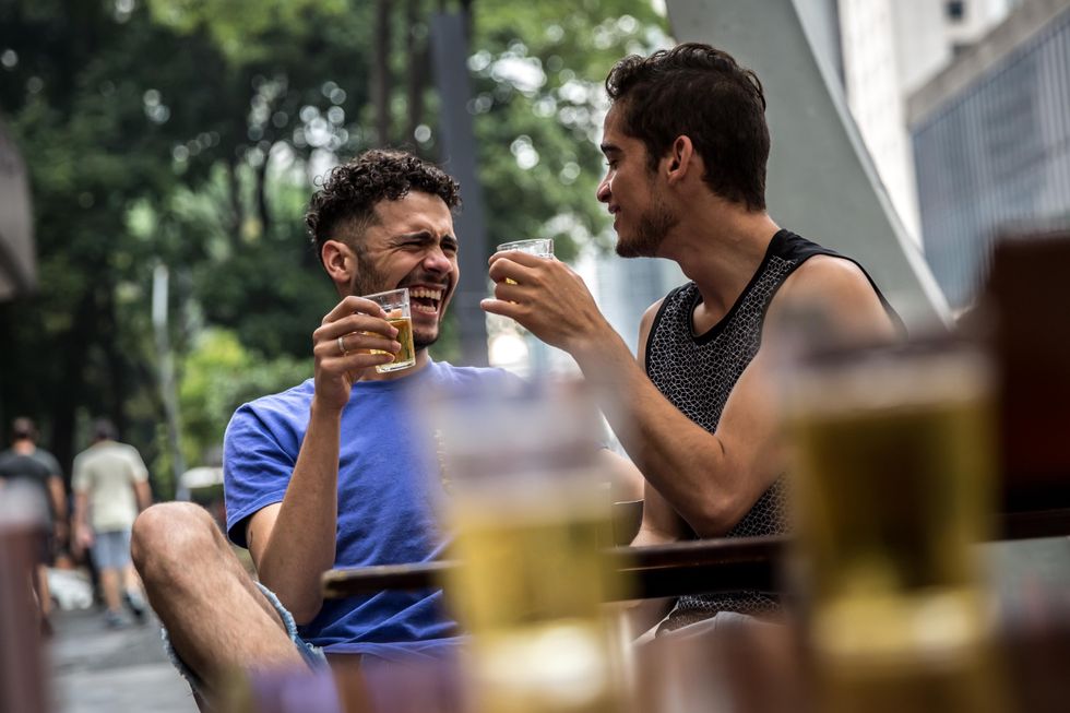 two men on a date drinking beer