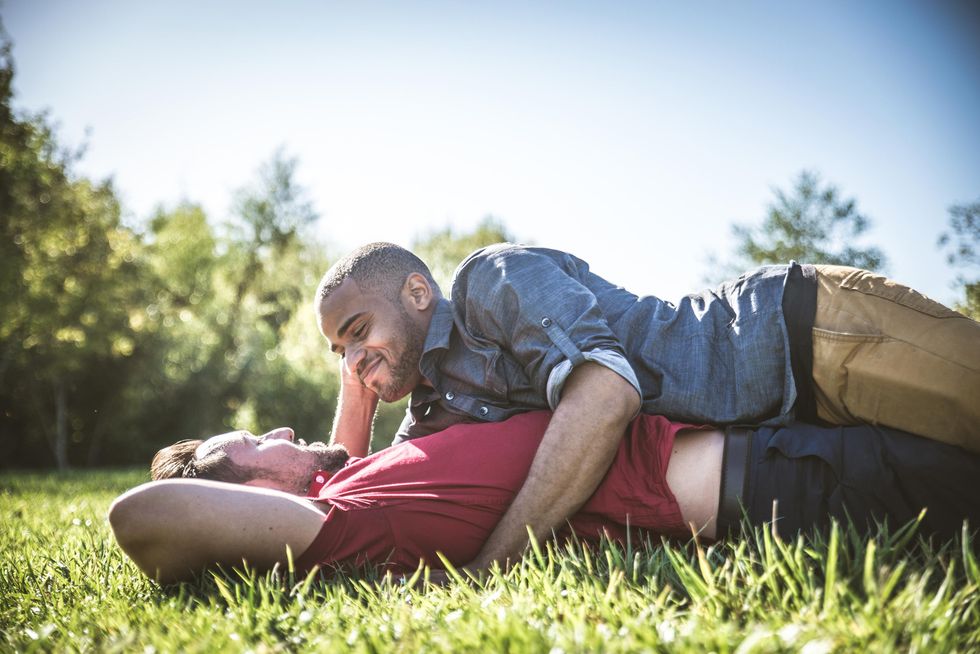 two men on a date in a field