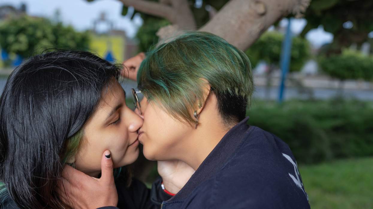 two queer people kissing, showing how to kiss