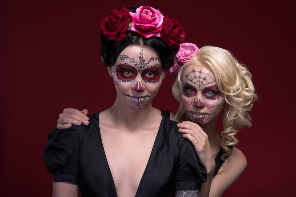 Two women in Halloween costumes