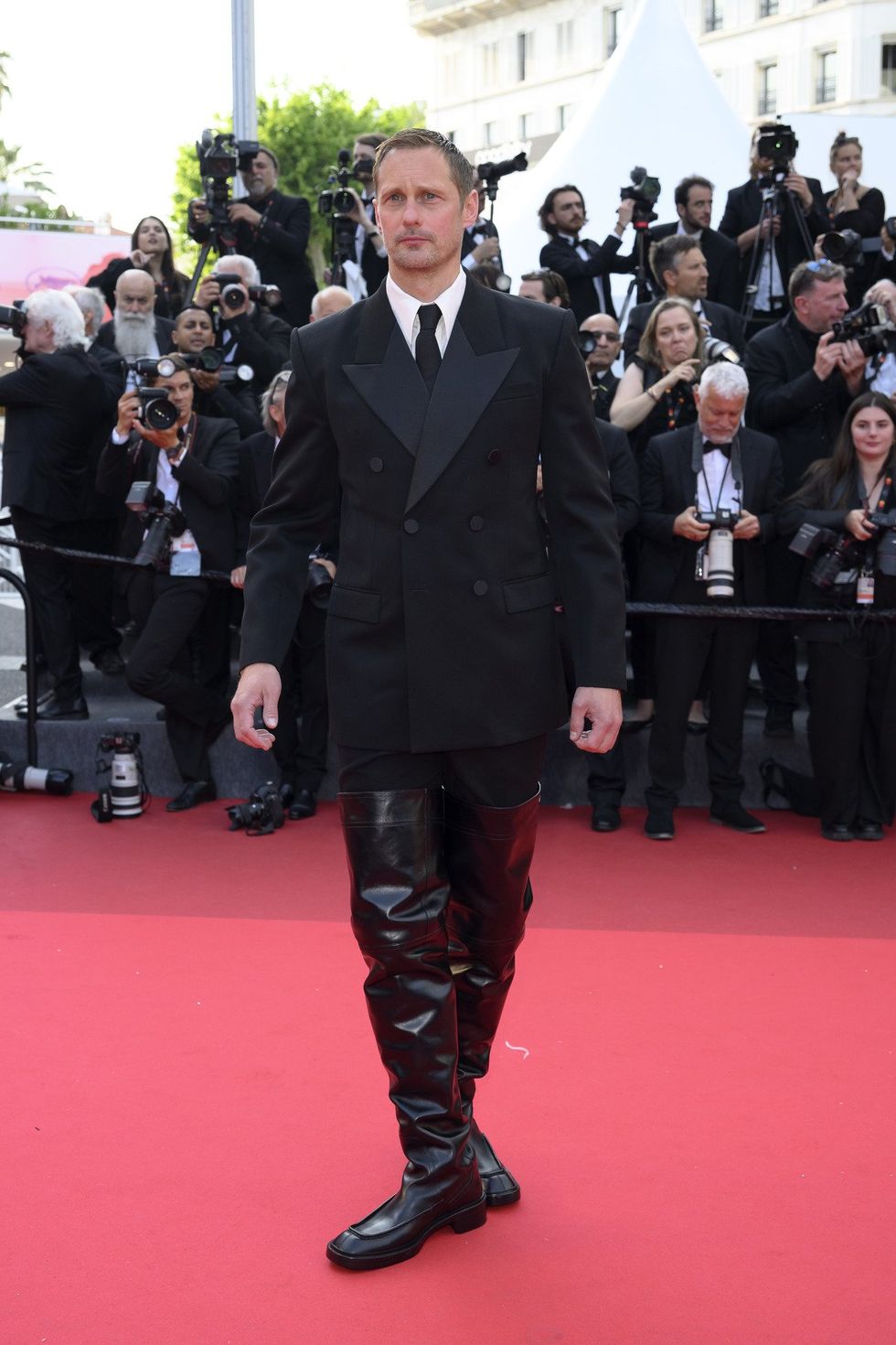 \u200bAlexander Skarsg\u00e5rd attends the "The Phoenician Scheme" red carpet at the 78th annual Cannes Film Festival at Palais des Festivals on May 18, 2025 in Cannes, France.