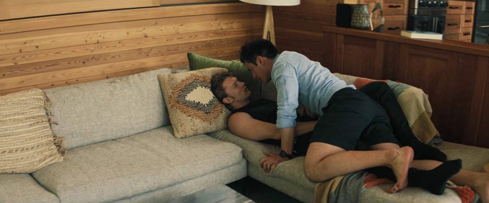 \u200bIlya and Shane on the couch in 'Heated Rivalry' episode 6.