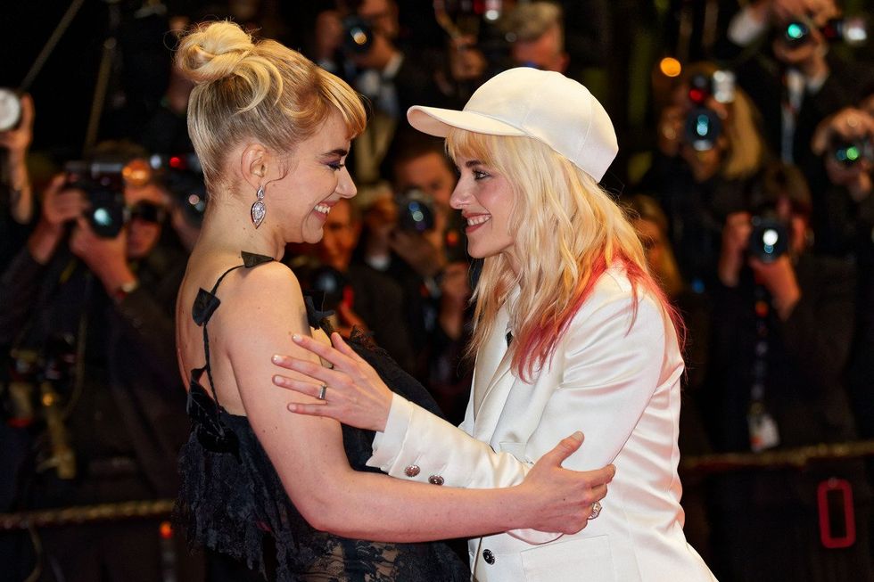 \u200bImogen Poots and Kristen Stewart attend the "Bono: Stories Of Surrender" red carpet at the 78th annual Cannes Film Festival at Palais des Festivals on May 16, 2025 in Cannes, France.