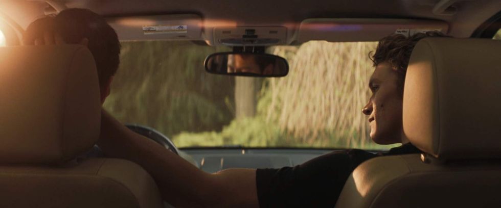 \u200bShane and Ilya in the car in 'Heated Rivalry.'