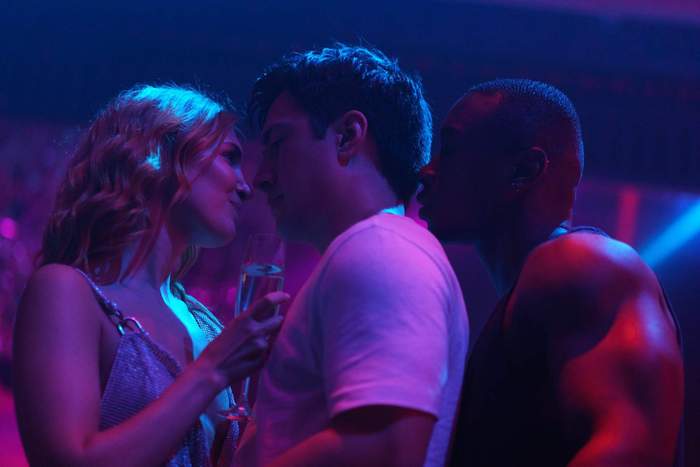 \u200bShane dancing with Rose and Miles in 'Heated Rivalry.'