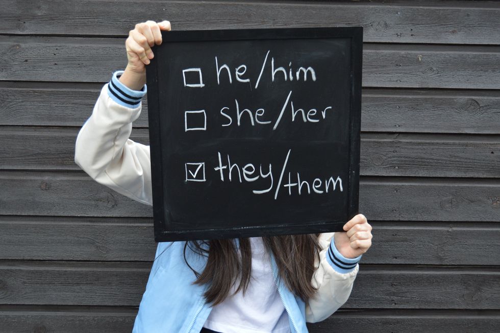 use of pronouns on a sign