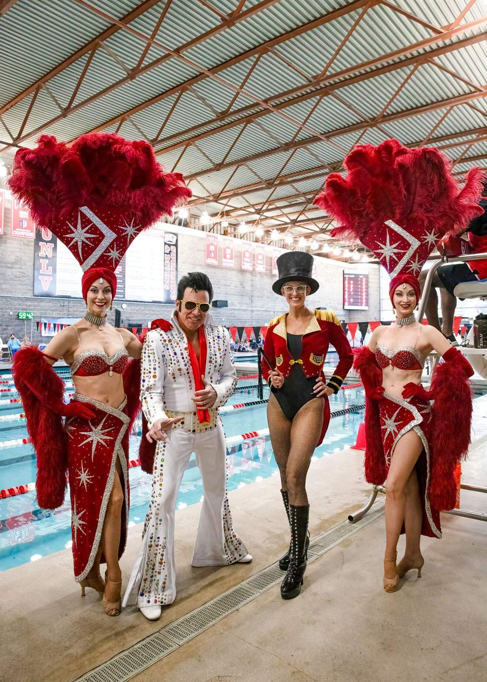 Vegas showgirls and an Elvis impersonator