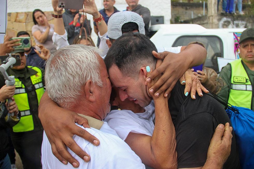 Venezuelan stylist Andry Hernandez Romero greets family members after returning home in Capacho village Tachira State Venezuela July 2025