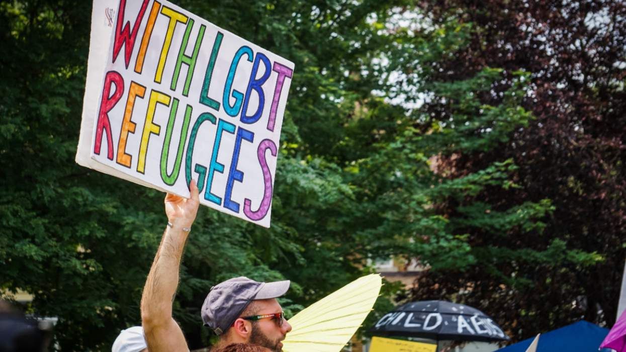 "With LGBT Refugees" protest sign