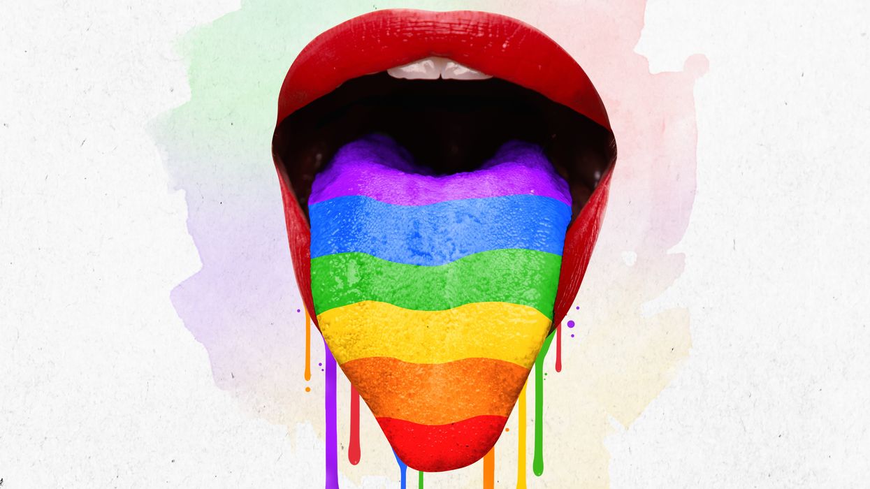 Woman's mouth tongue sticking out and painted with colors of rainbow dripping with colorful paint