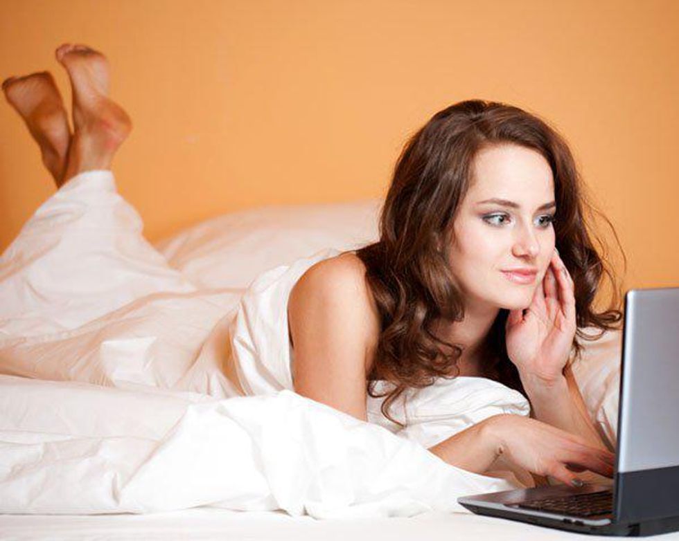 Woman surfs internet.