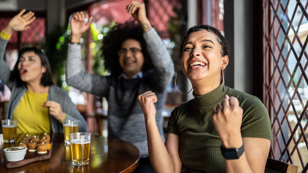 Women celebrating at a sports bar